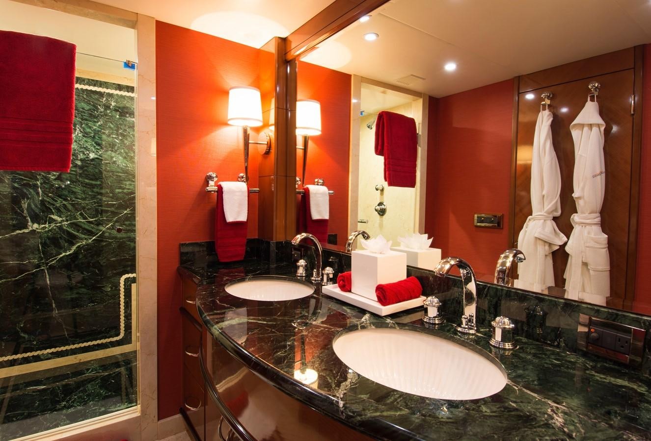 a bathroom with a large mirror aboard HORIZONS II Yacht for Sale
