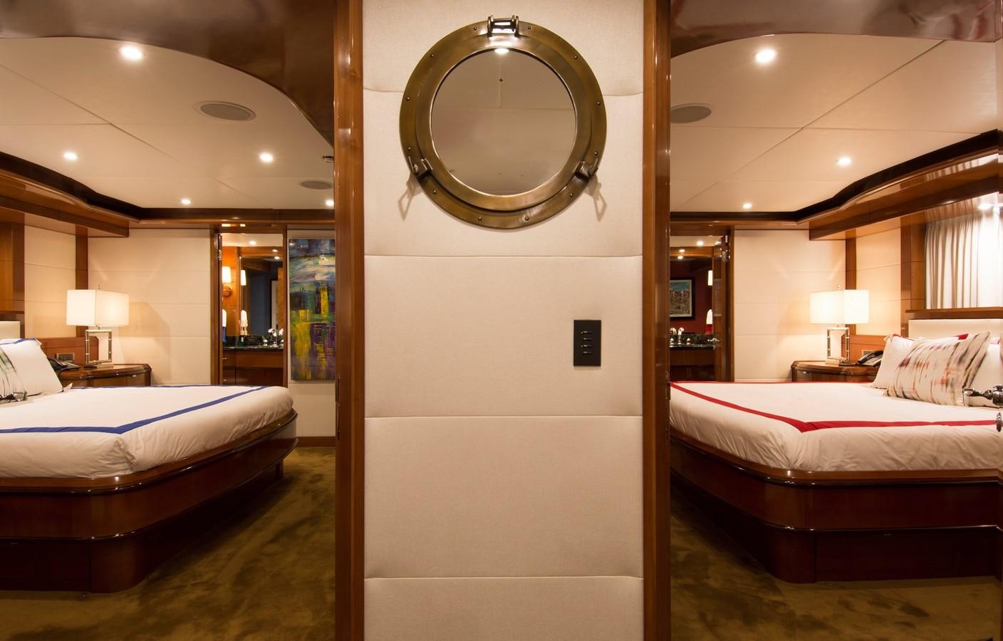 a hotel room with a large mirror aboard HORIZONS II Yacht for Sale