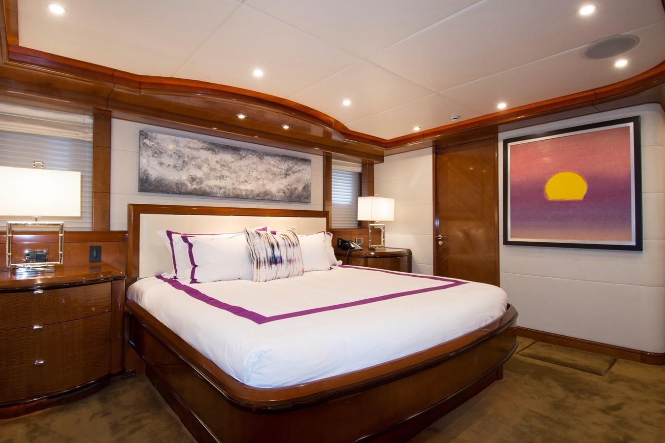 a large bedroom with a large bed aboard HORIZONS II Yacht for Sale