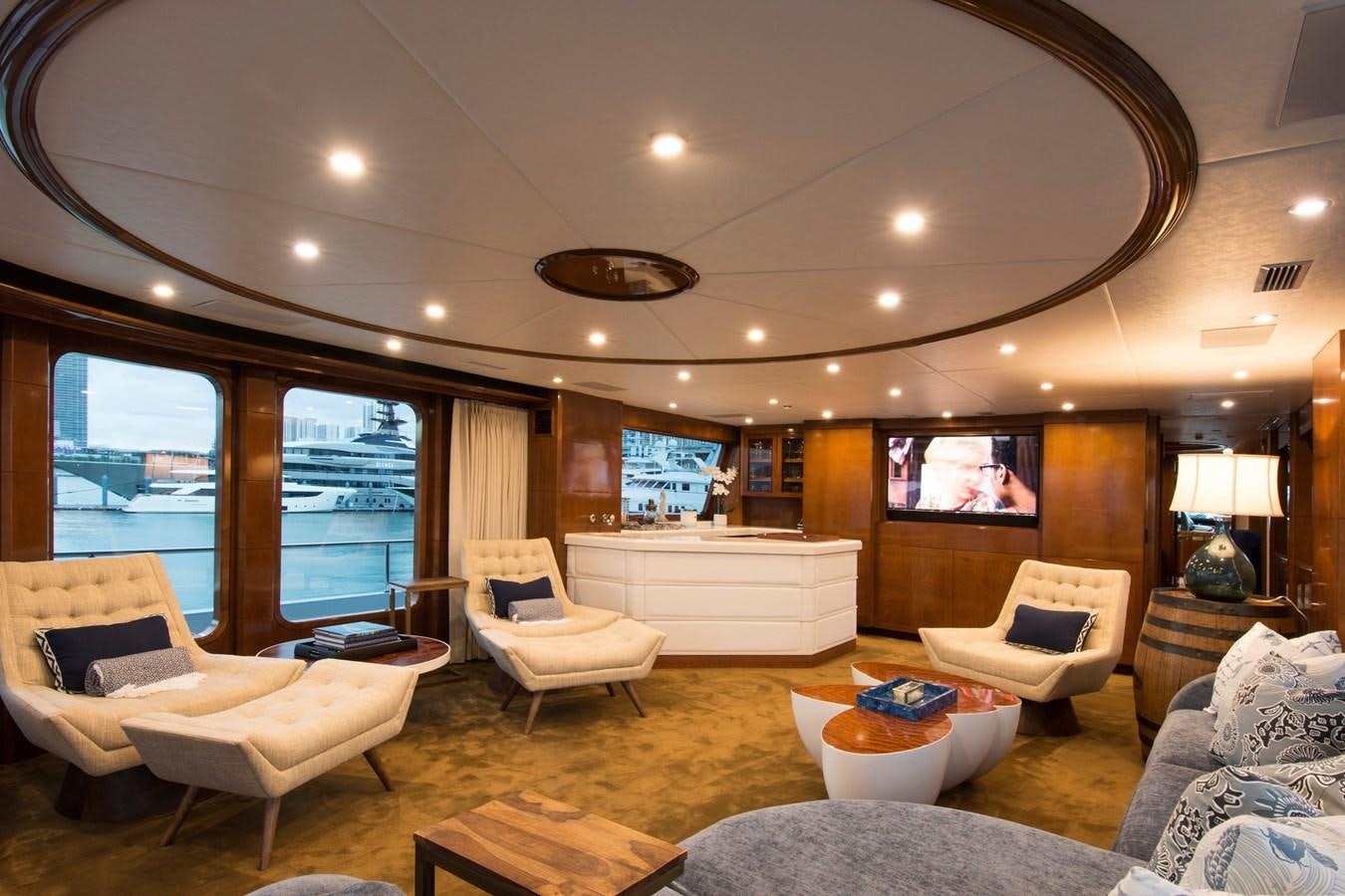a living room with a large window aboard HORIZONS II Yacht for Sale