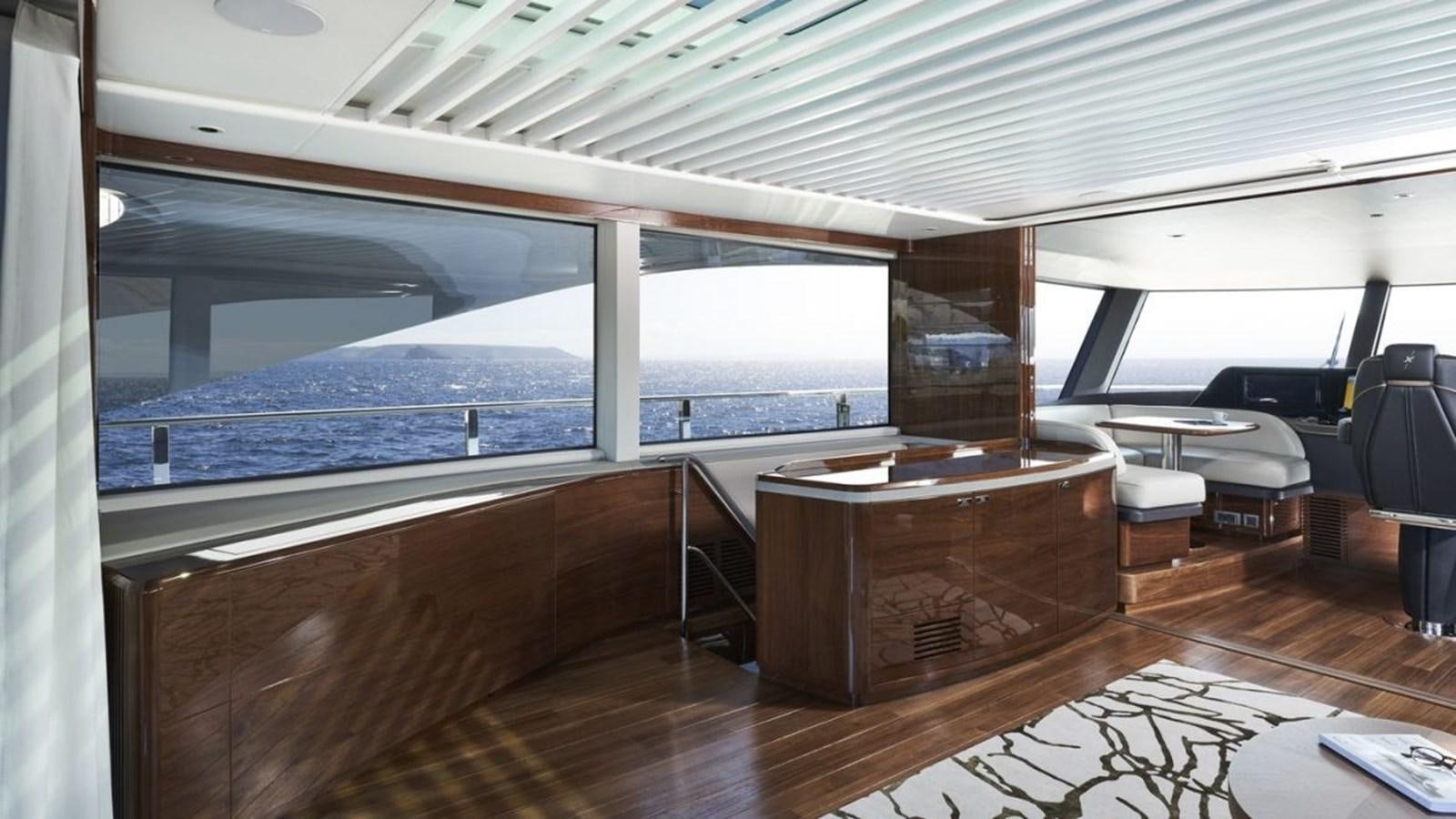 a room with a large window aboard PRINCESS X95/03 Yacht for Sale