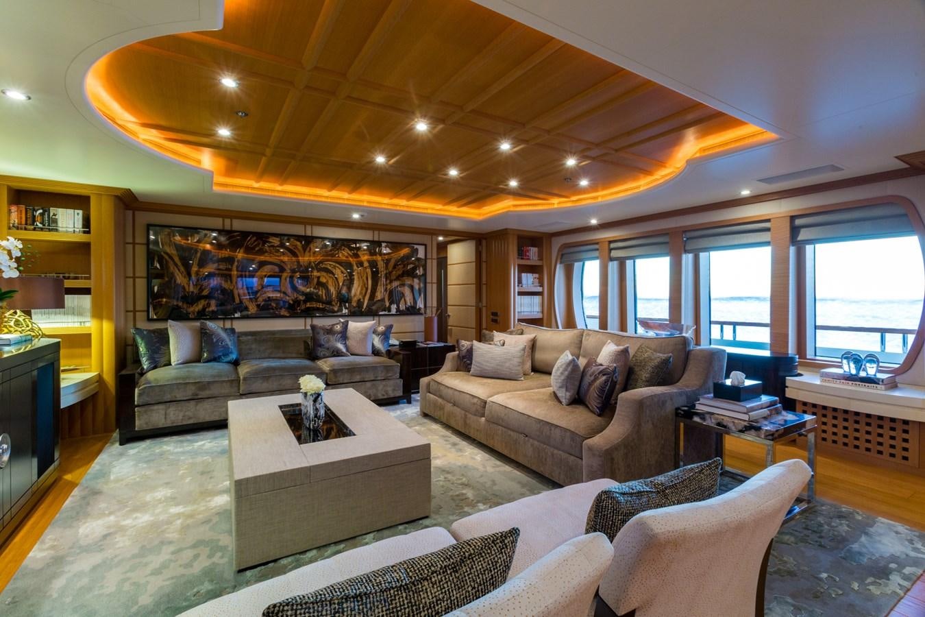 a living room with a large window aboard ADVENTURE Yacht for Sale