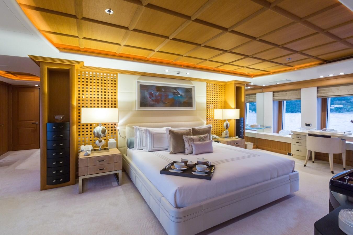 a large bedroom with a large bed aboard ADVENTURE Yacht for Sale