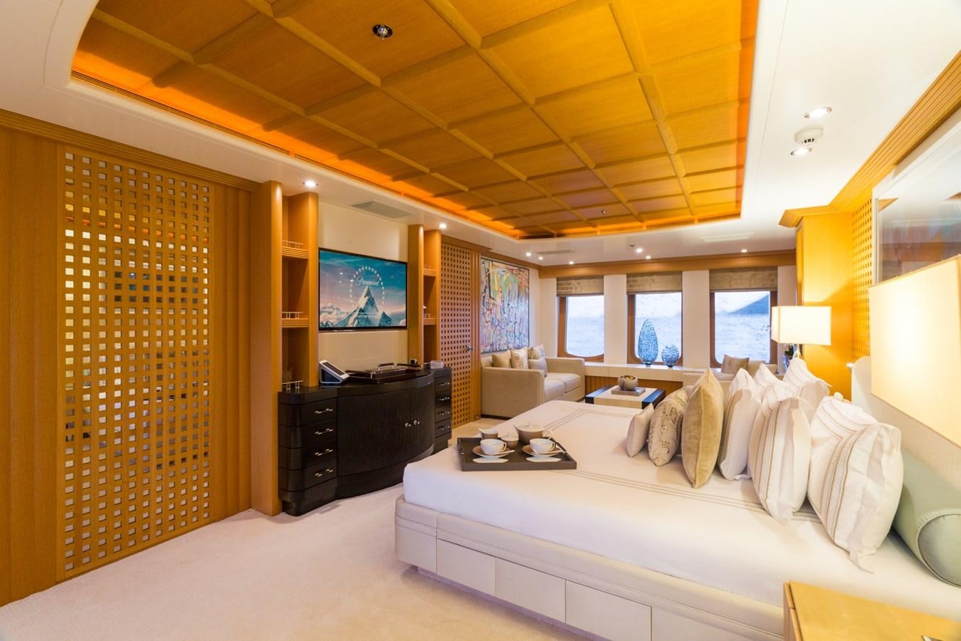 a bedroom with a large bed aboard ADVENTURE Yacht for Sale