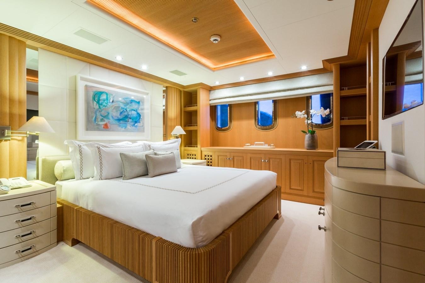 a bedroom with a large bed aboard ADVENTURE Yacht for Sale