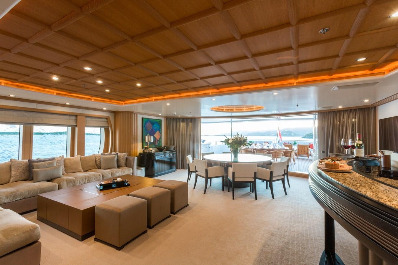 a living room with a large window aboard ADVENTURE Yacht for Sale
