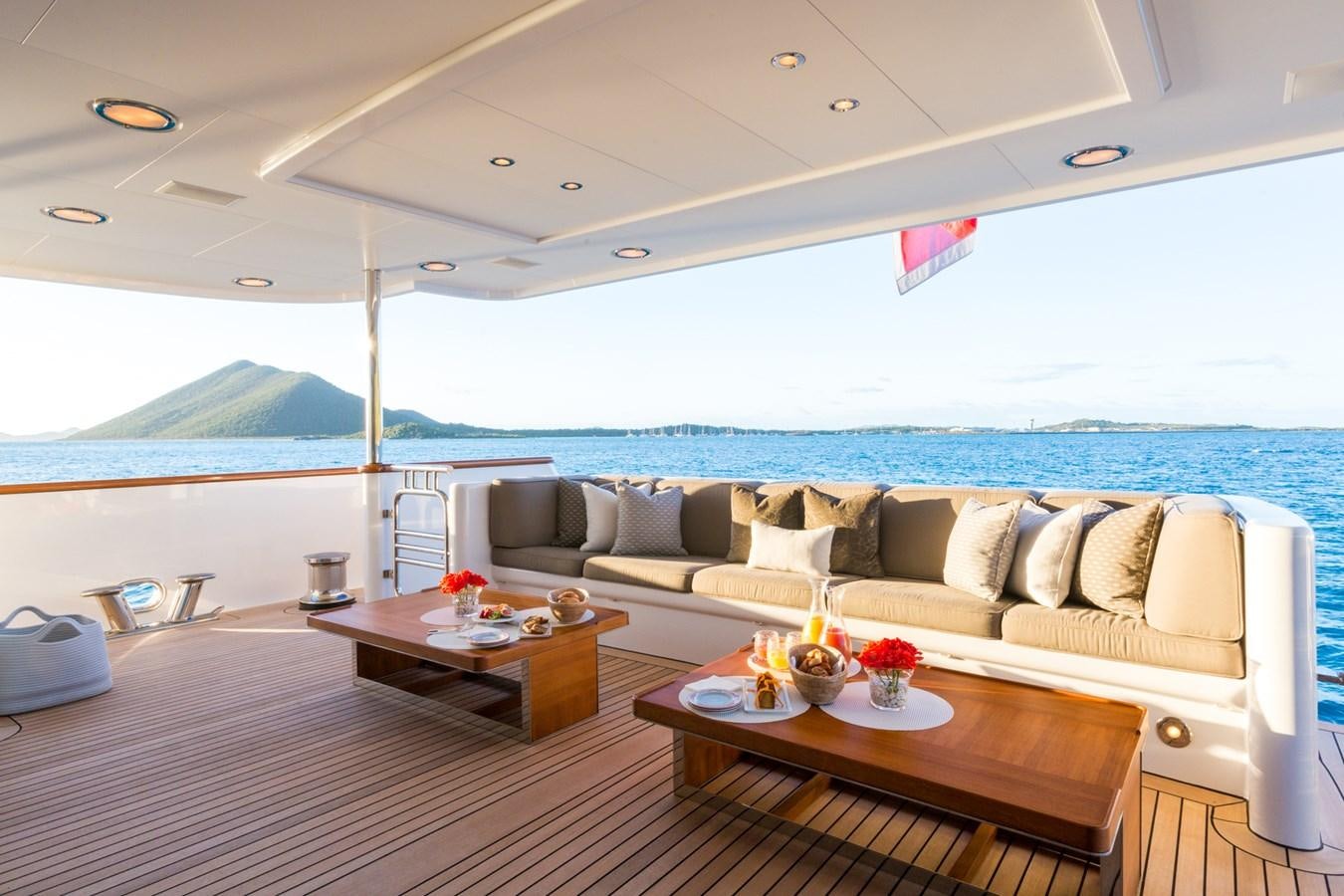 a living room with a large ocean aboard ADVENTURE Yacht for Sale