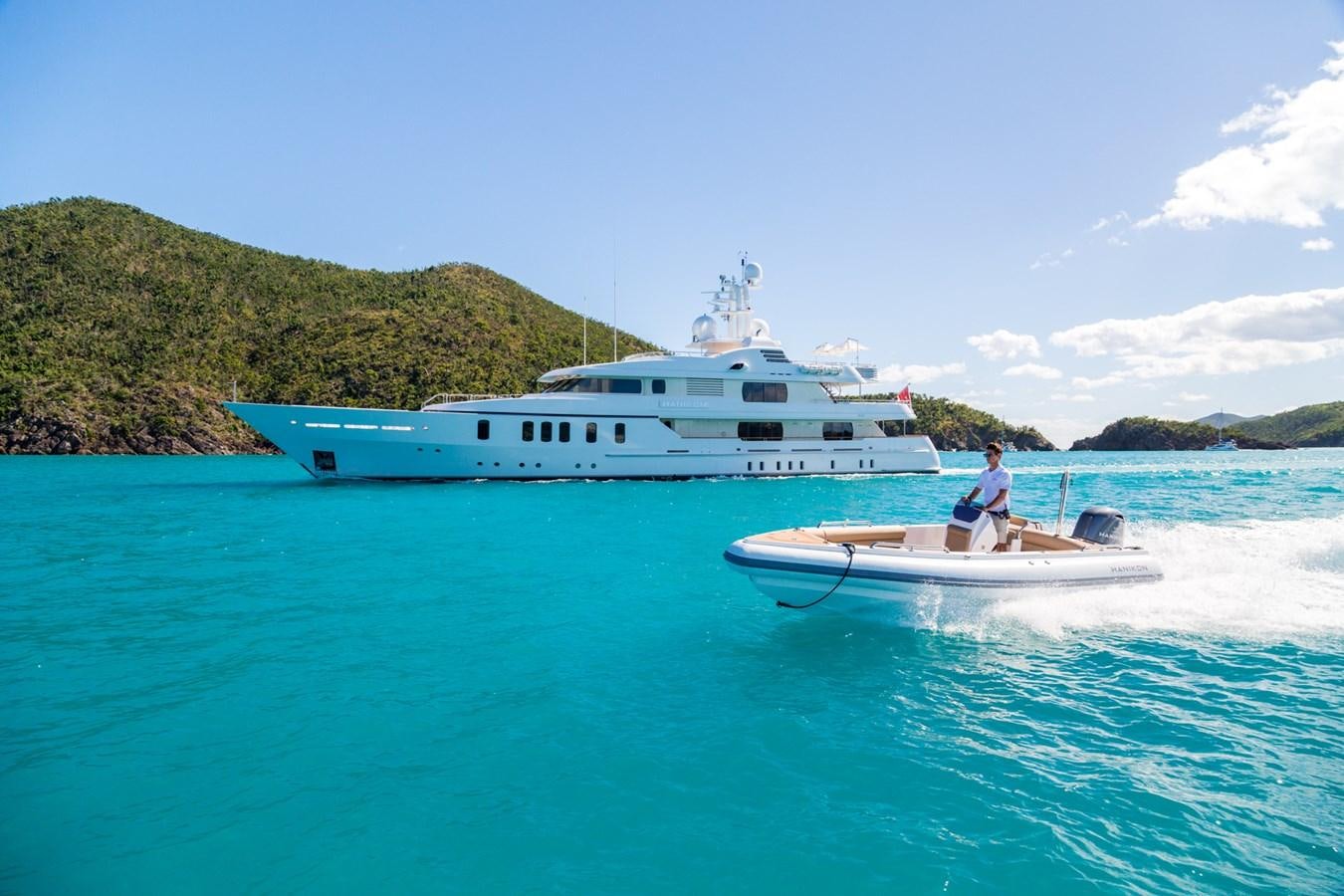 a person on a boat in the water aboard ADVENTURE Yacht for Sale