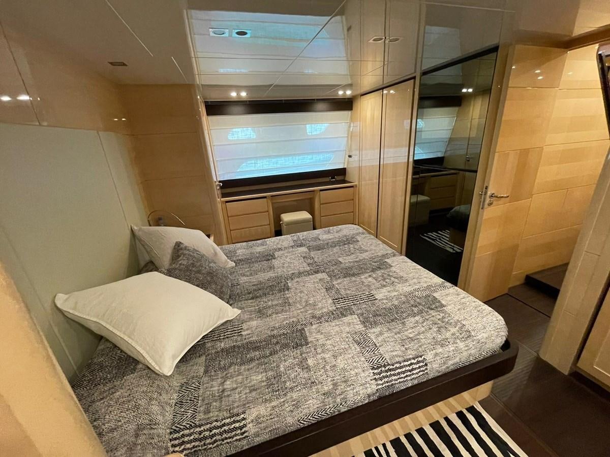 a bed in a room aboard LIBERATA Yacht for Sale