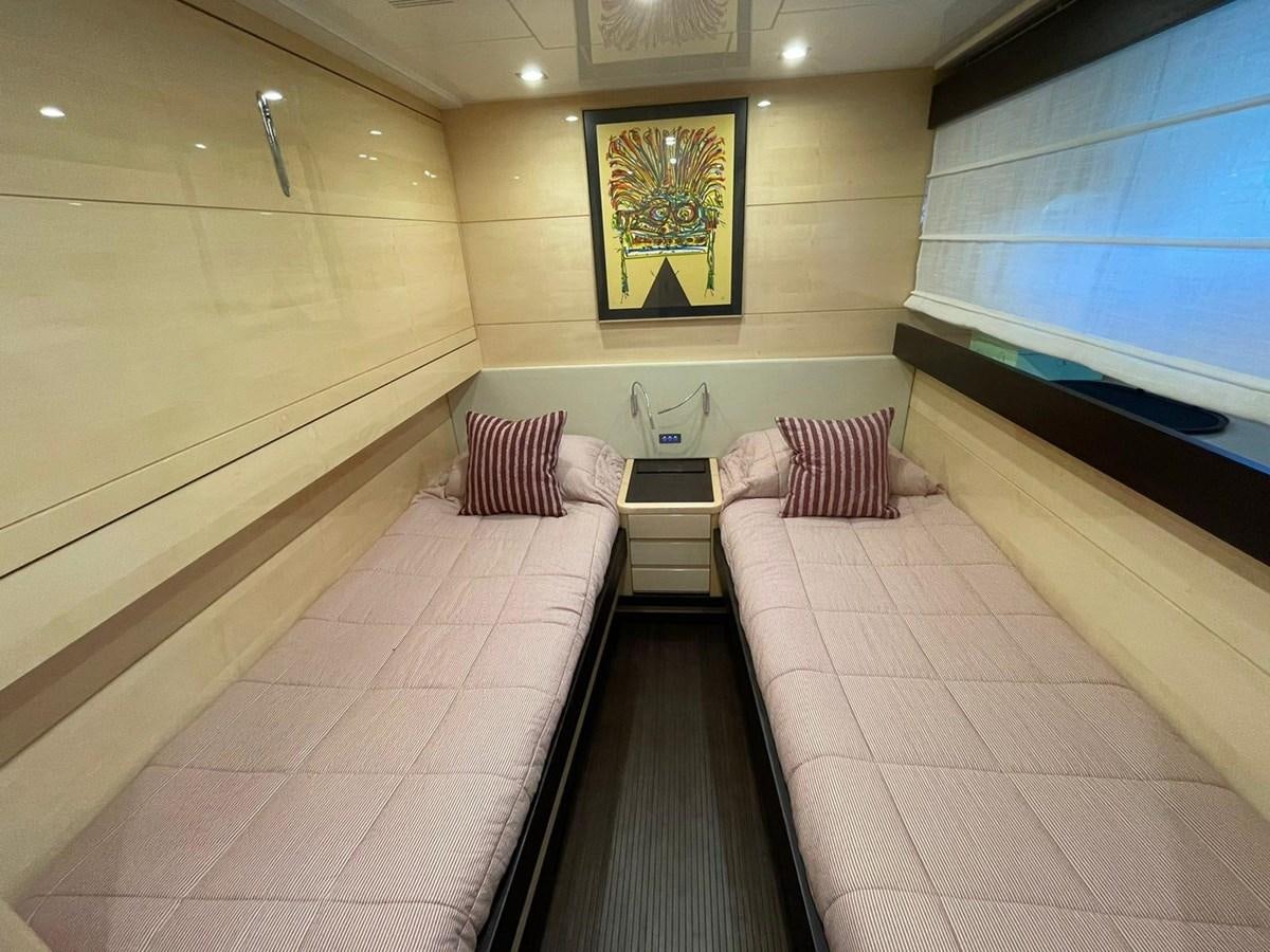 a room with a couch and a table aboard LIBERATA Yacht for Sale
