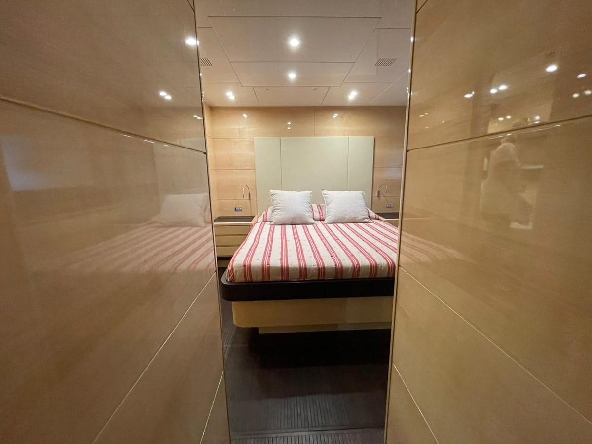 a bed in a room aboard LIBERATA Yacht for Sale