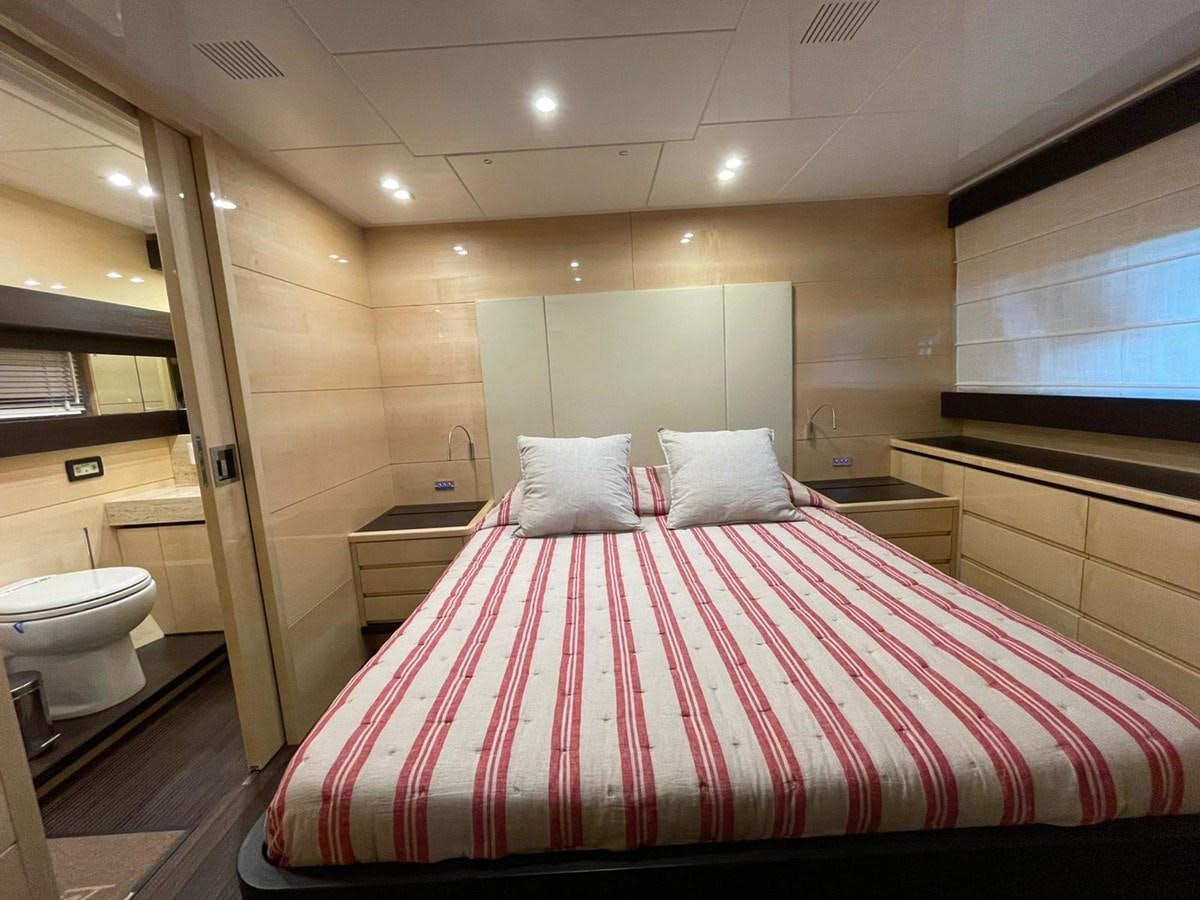 a bed in a room aboard LIBERATA Yacht for Sale