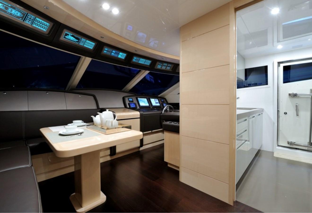 a room with a desk and a computer aboard LIBERATA Yacht for Sale