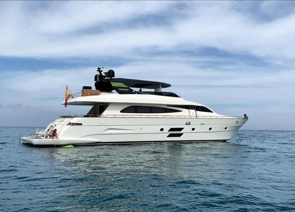 a white yacht in the water aboard LIBERATA Yacht for Sale