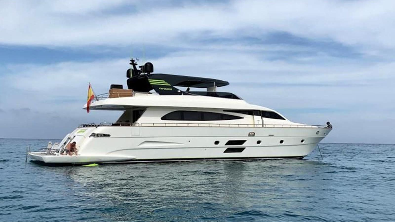 a white yacht in the water aboard LIBERATA Yacht for Sale