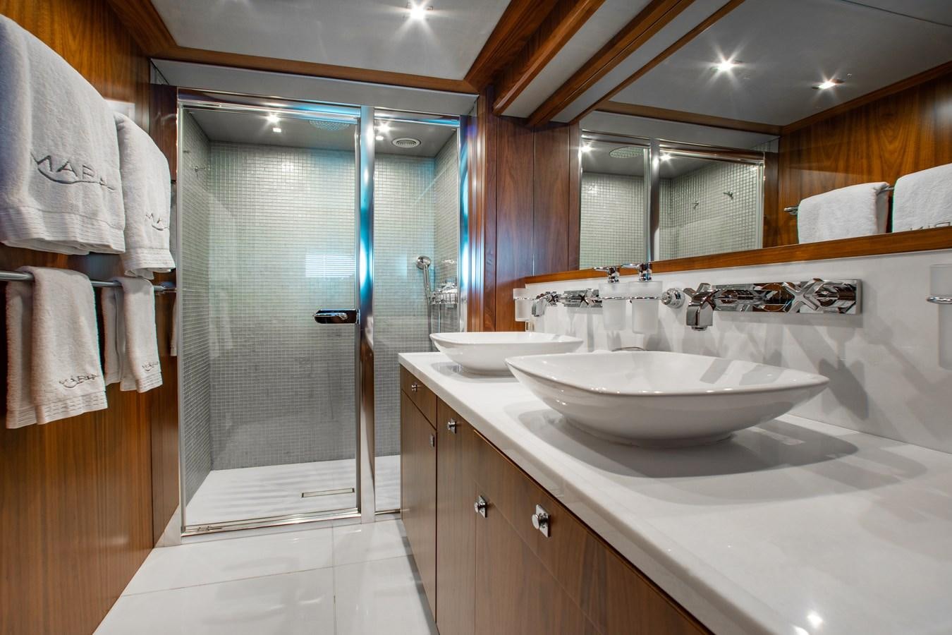 a bathroom with a sink and a shower aboard MARIN Yacht for Sale