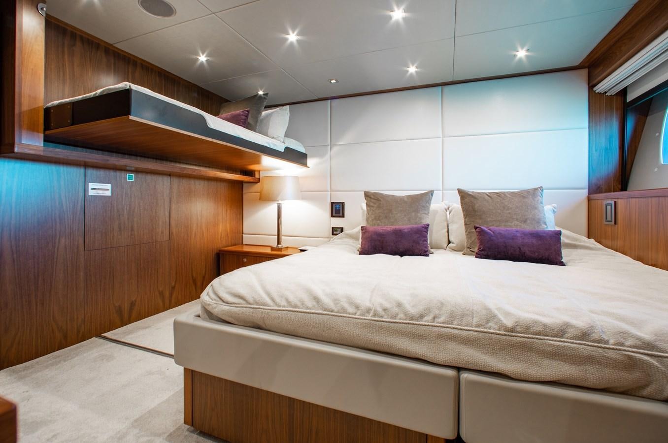 a room with a bed and a desk aboard MARIN Yacht for Sale
