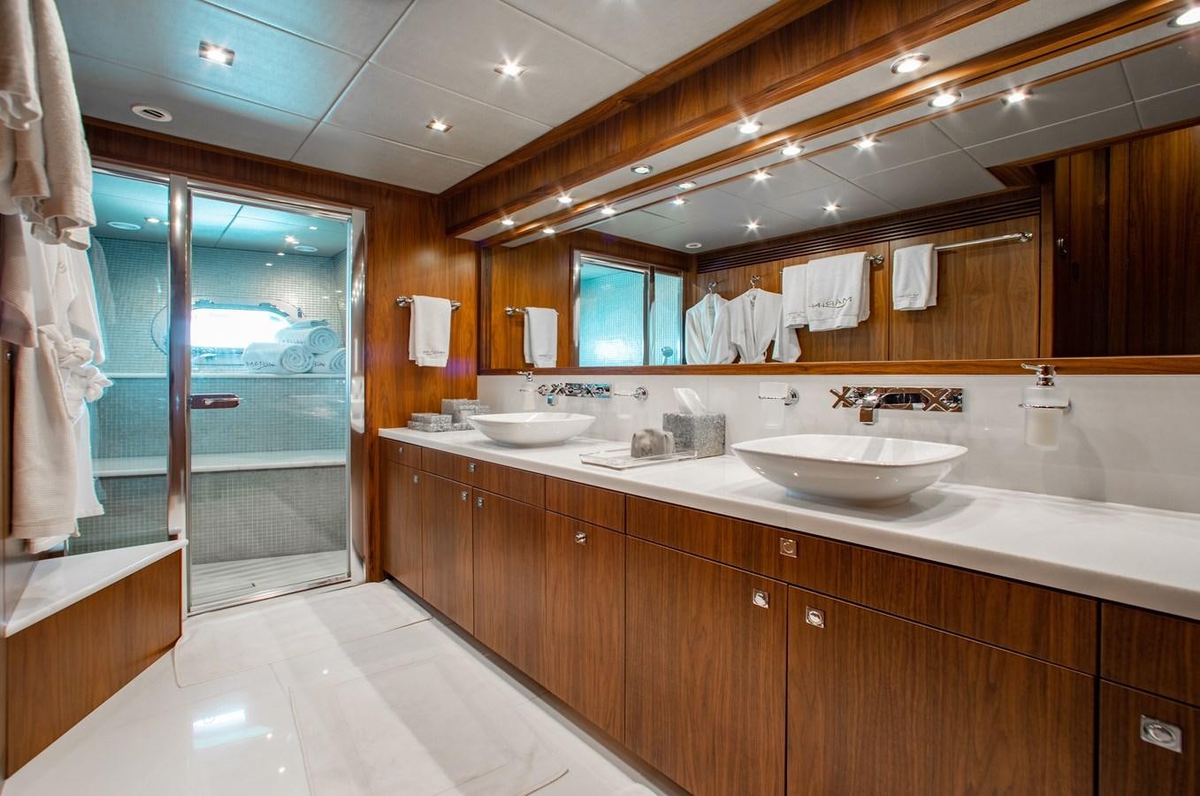a bathroom with a large mirror aboard MARIN Yacht for Sale