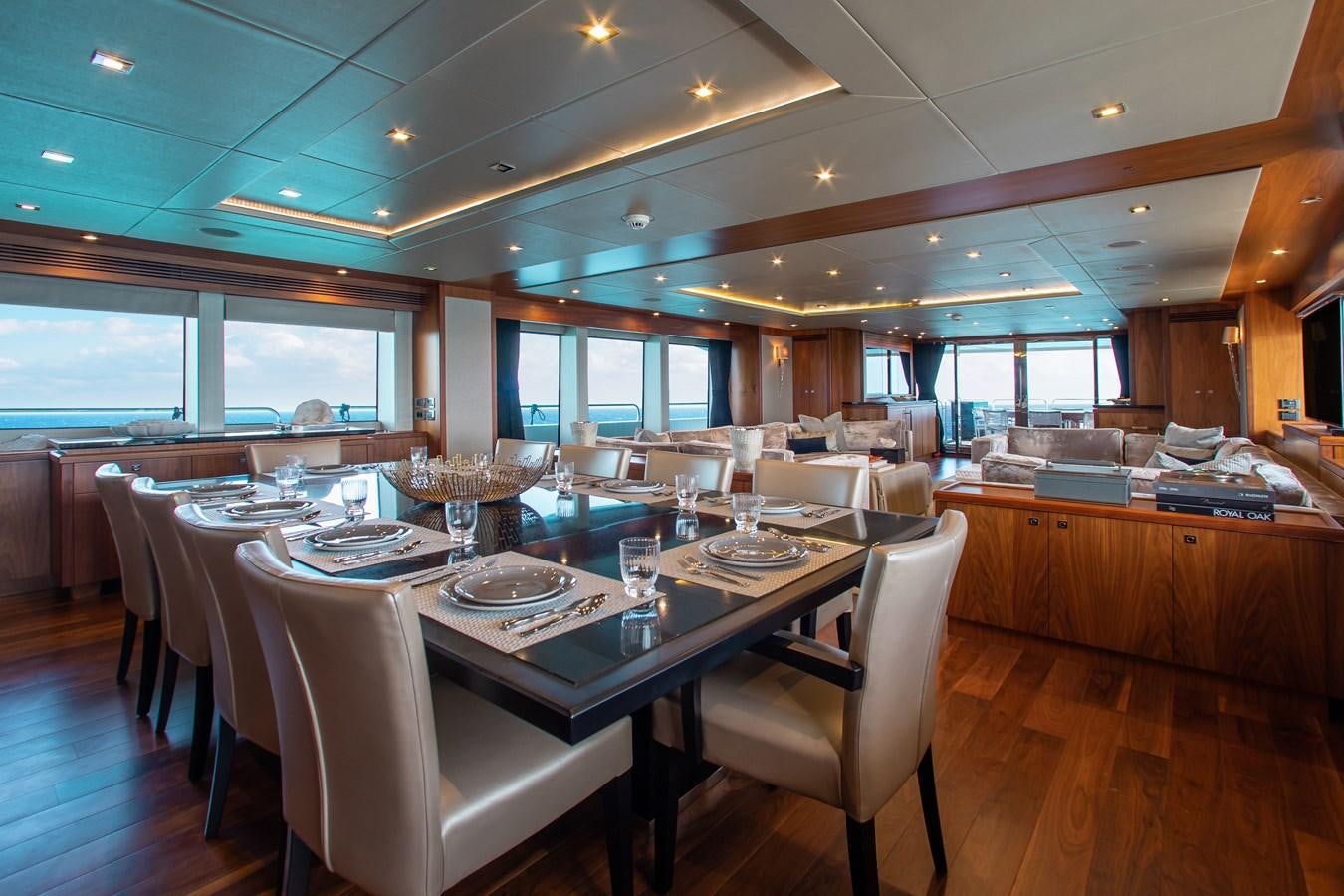 a large dining room with a table and chairs aboard MARIN Yacht for Sale