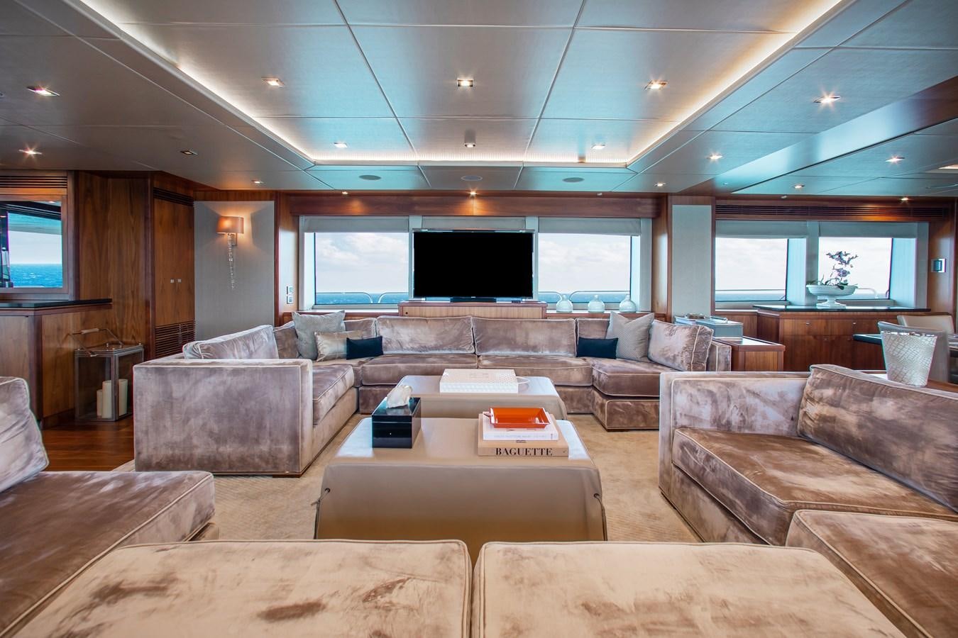 a living room with a large screen aboard MARIN Yacht for Sale