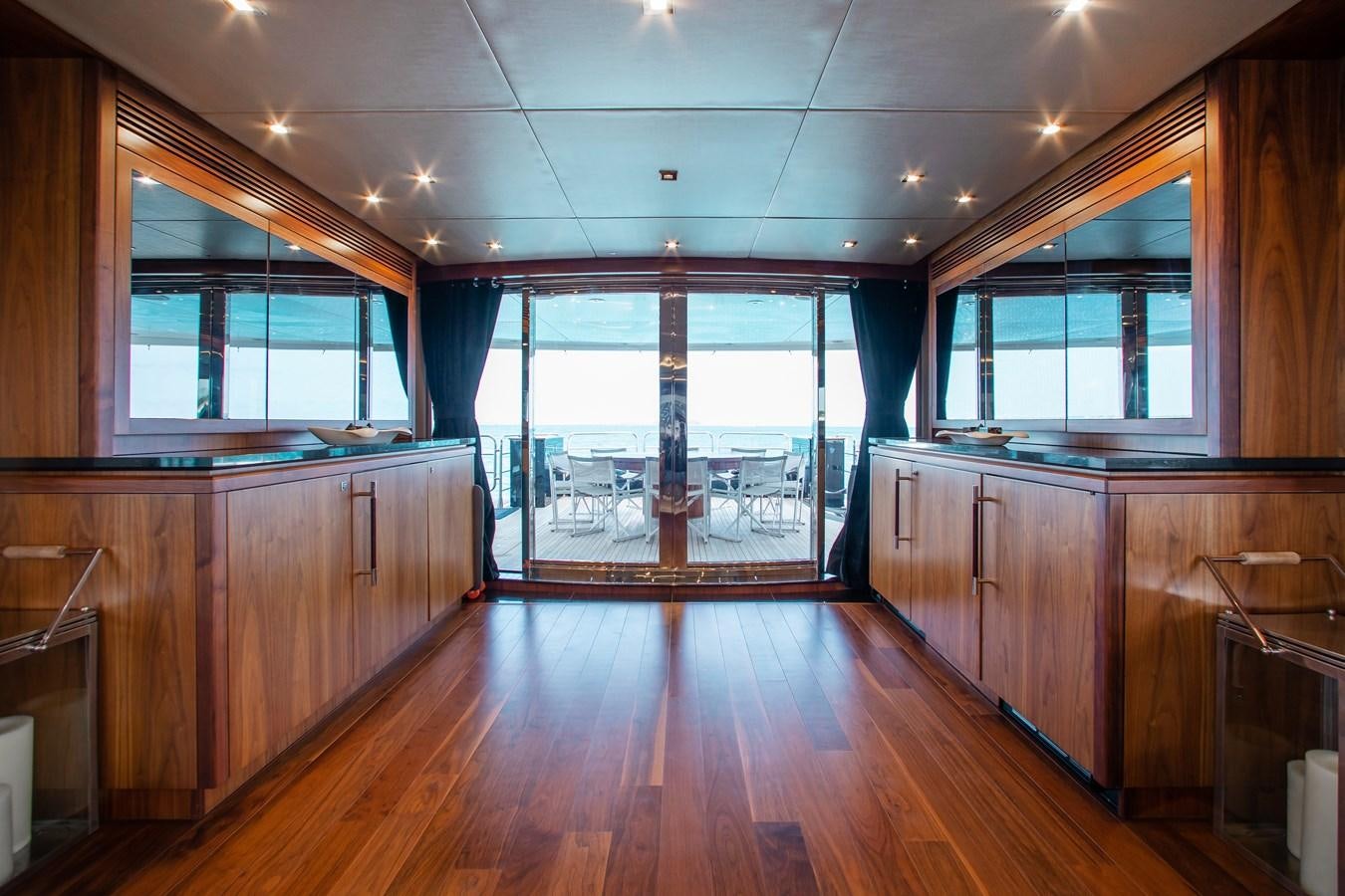 a kitchen with wooden cabinets aboard MARIN Yacht for Sale