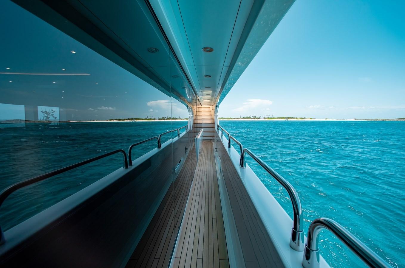 a wooden walkway over water aboard MARIN Yacht for Sale