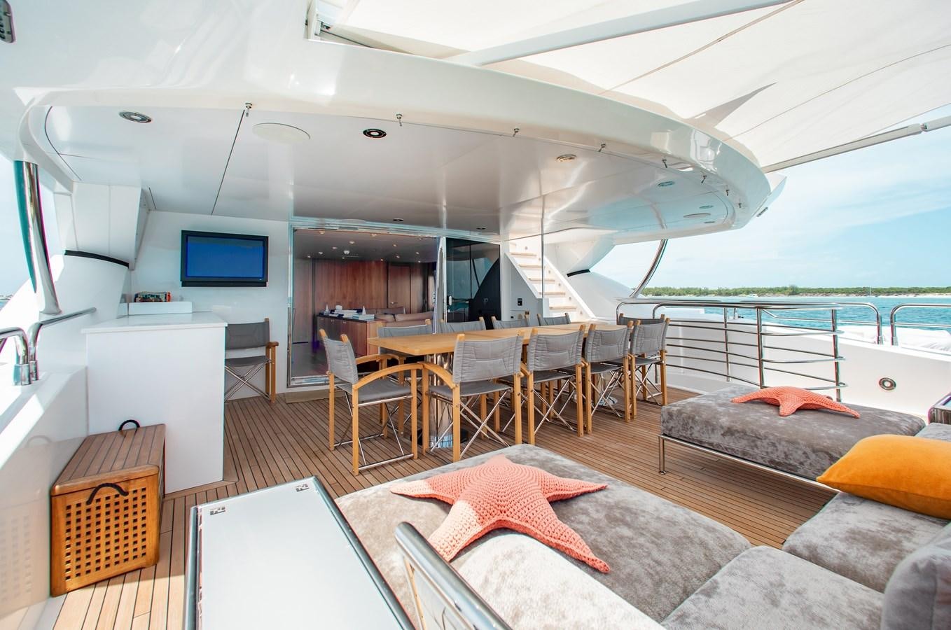 a living room with a large balcony aboard MARIN Yacht for Sale