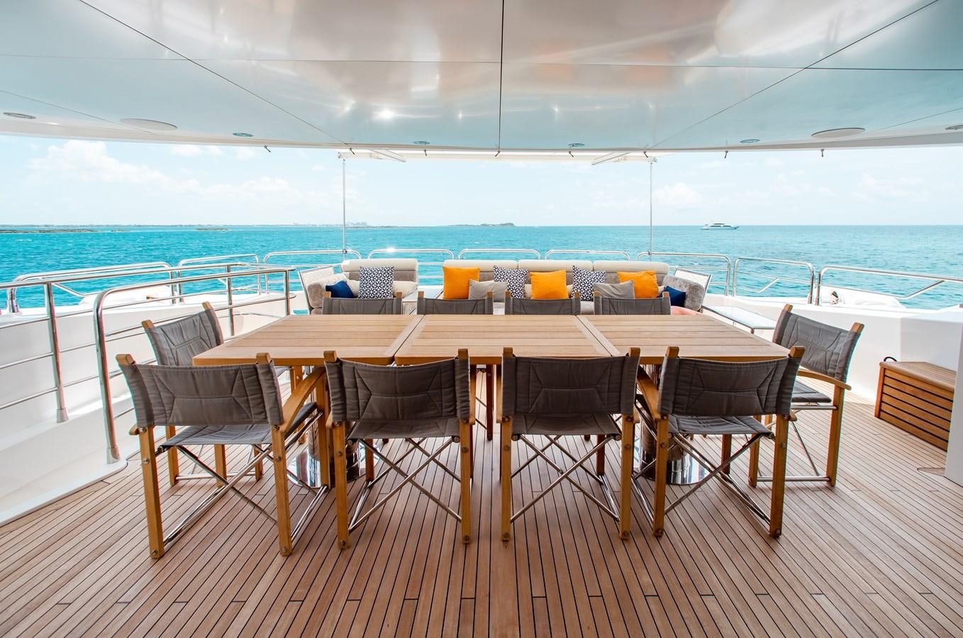 a table set up on a deck overlooking the ocean aboard MARIN Yacht for Sale