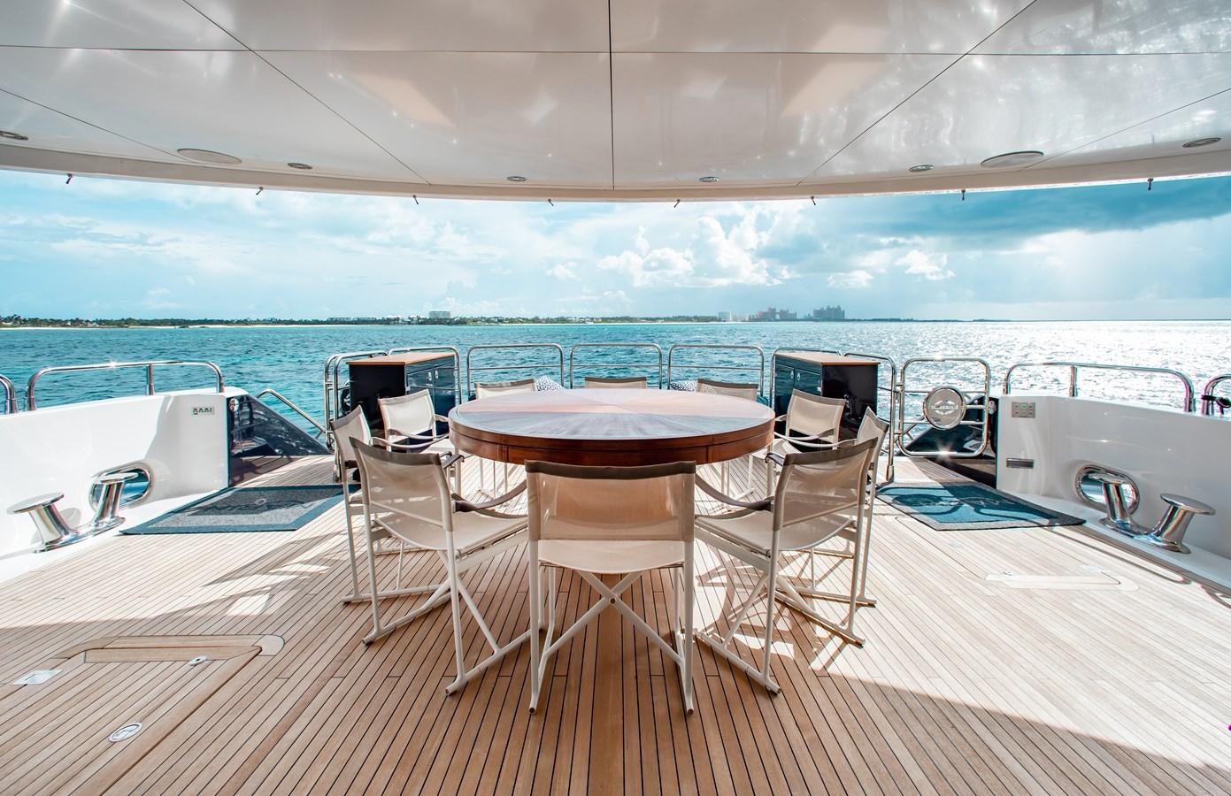 a table and chairs on a deck aboard MARIN Yacht for Sale