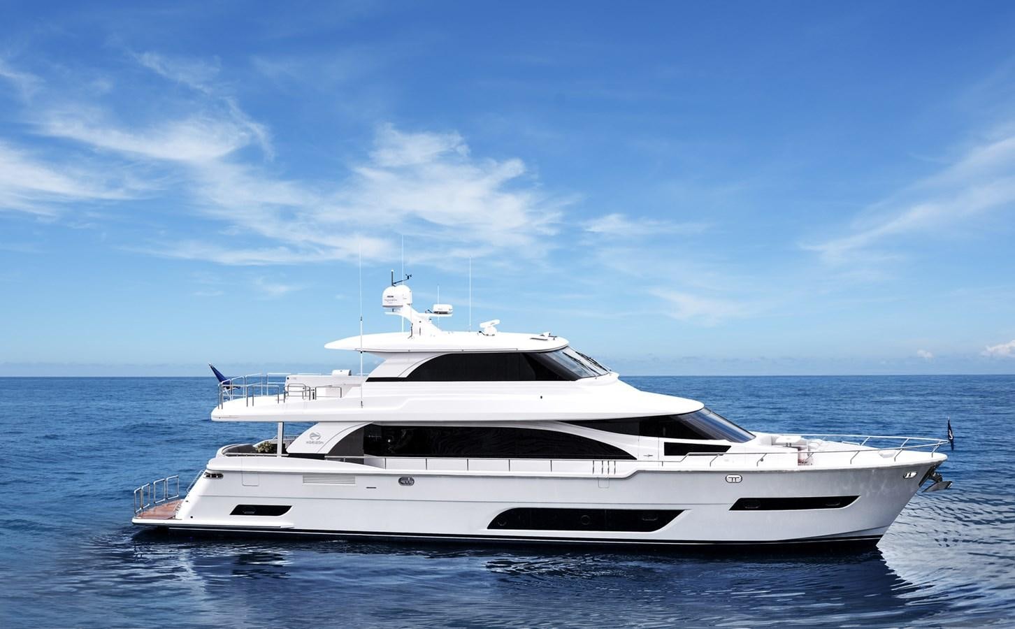 a white yacht in the water aboard E81 Yacht for Sale
