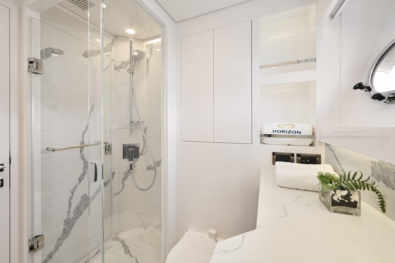 a shower unit in a bathroom aboard E81 Yacht for Sale