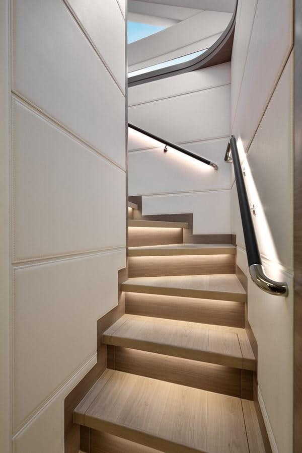 a flight of stairs aboard E81 Yacht for Sale