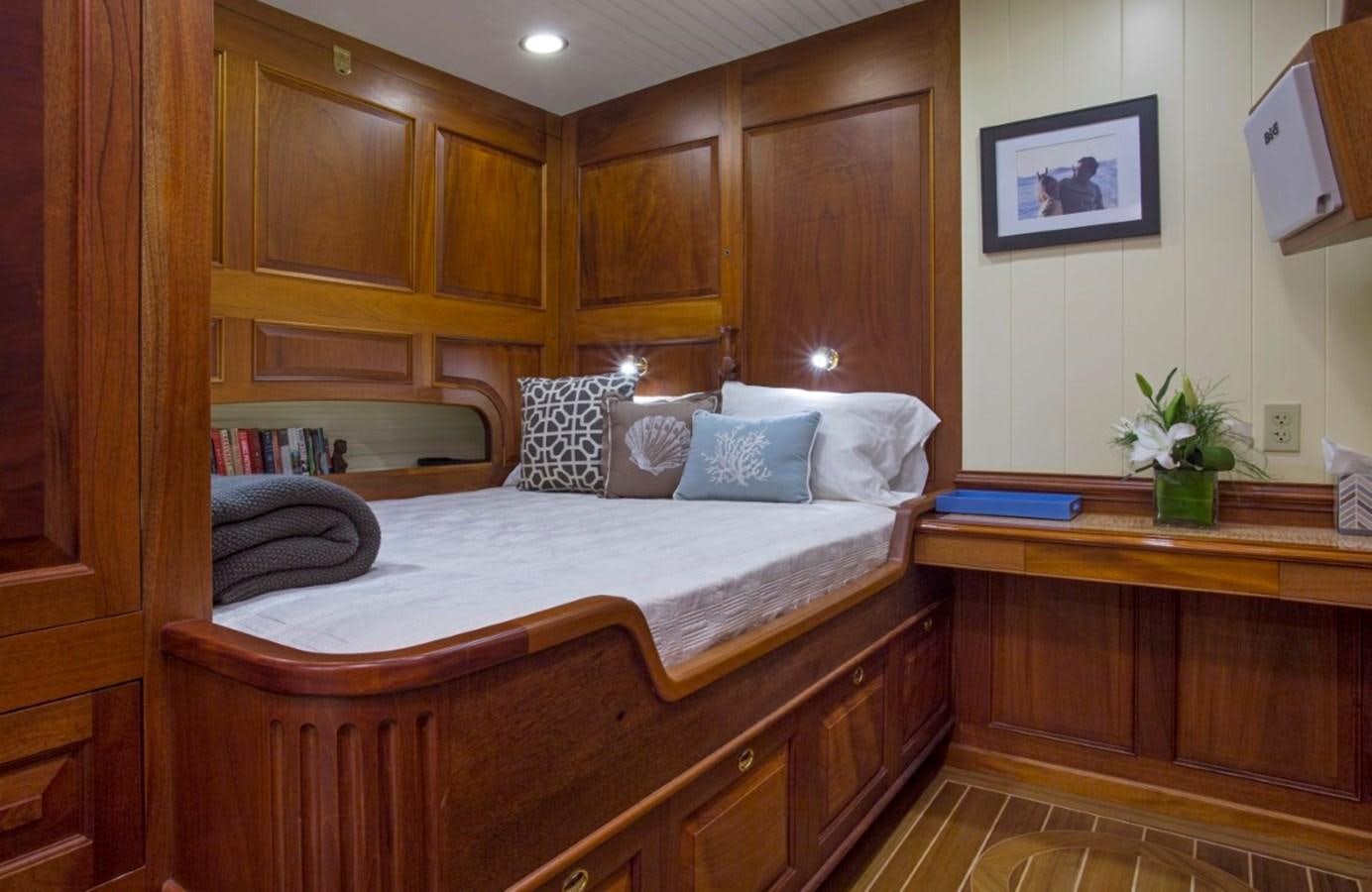 a bed in a room aboard COLUMBIA Yacht for Charter