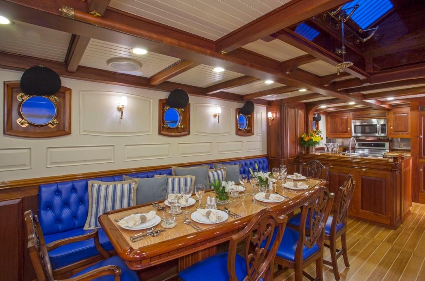a large dining room with tables and chairs aboard COLUMBIA Yacht for Charter