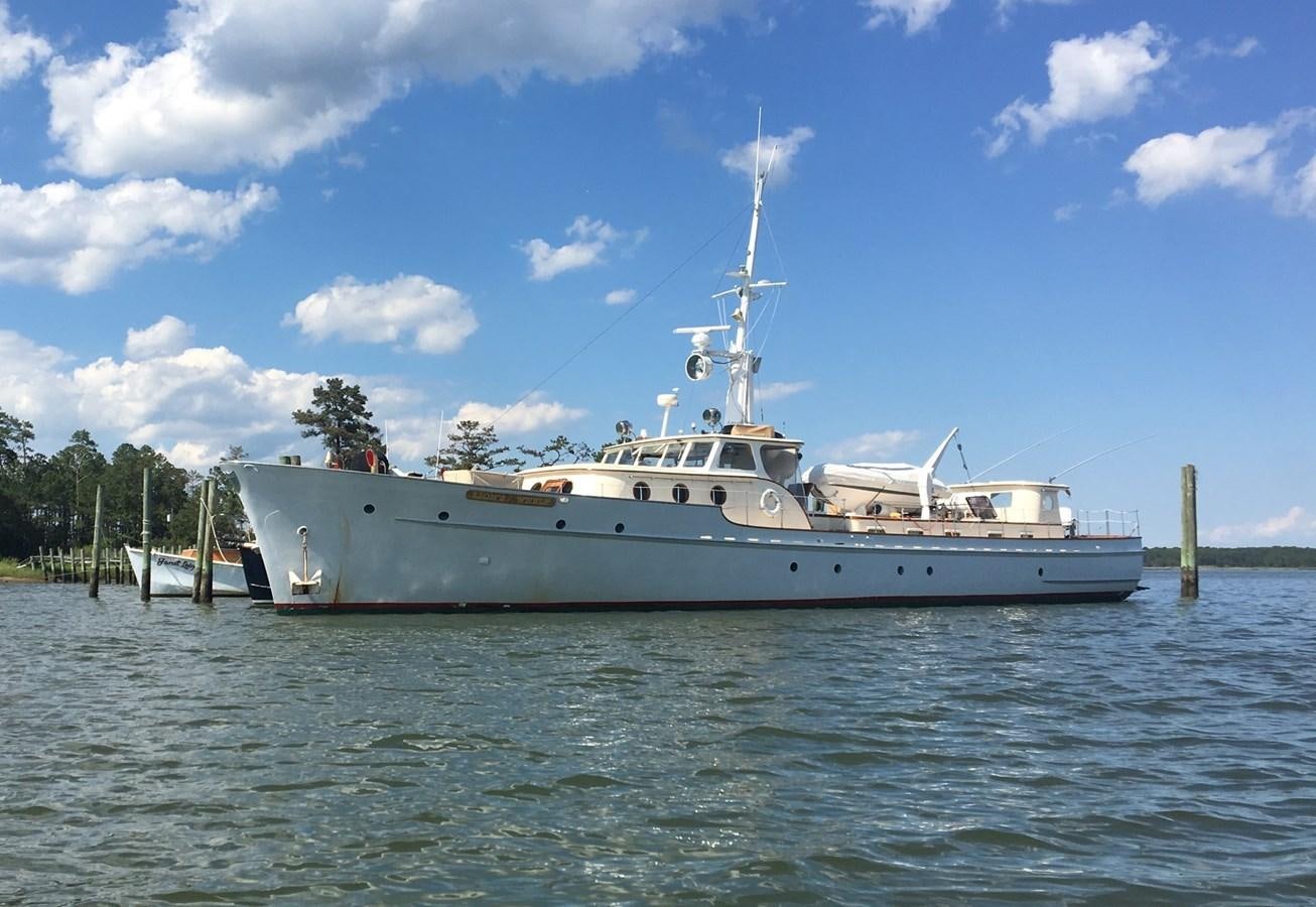 a large white boat in the water aboard LION'S WHELP Yacht for Sale