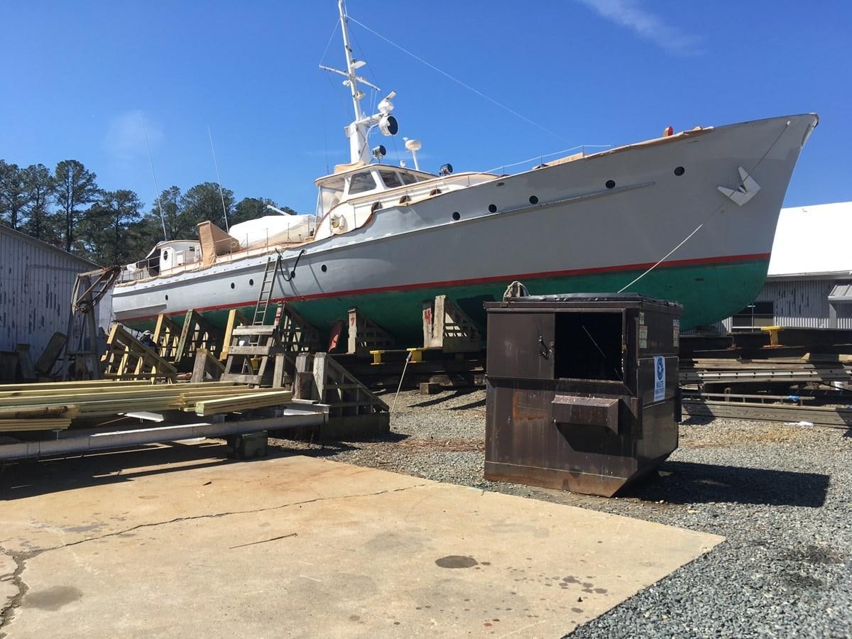 a boat on a trailer aboard LION'S WHELP Yacht for Sale
