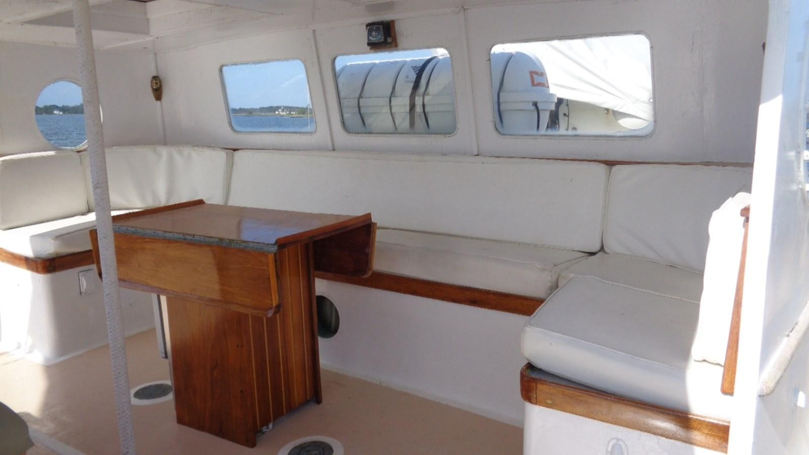 a room with a desk and a window aboard LION'S WHELP Yacht for Sale