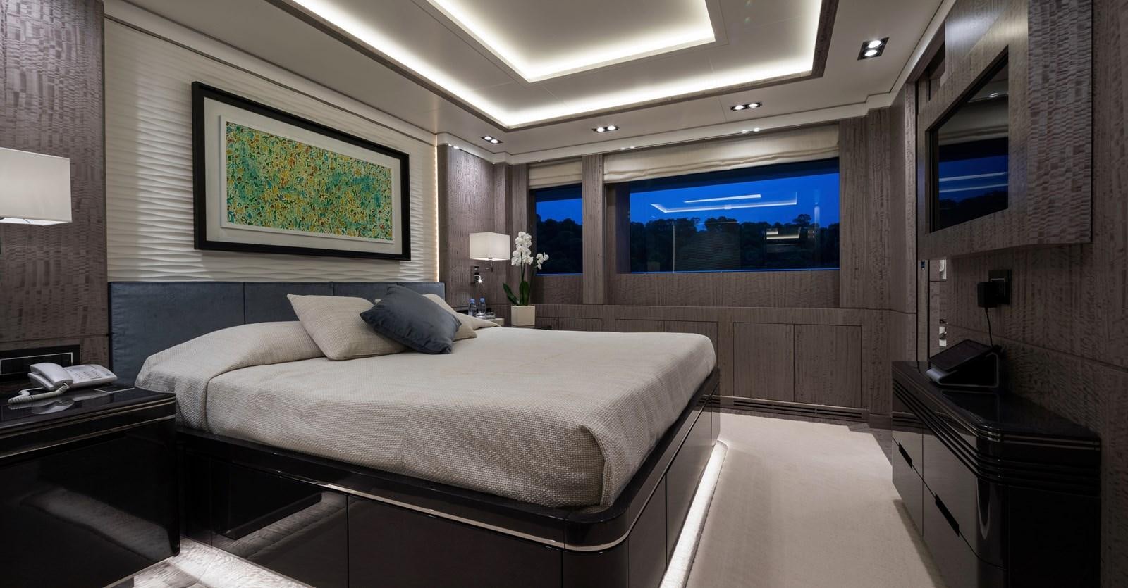 a bed in a room aboard O'PTASIA Yacht for Charter