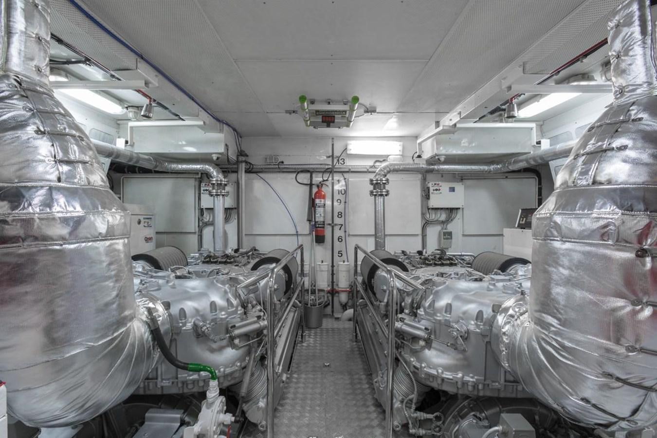 a room with machinery aboard MADNESS Yacht for Sale