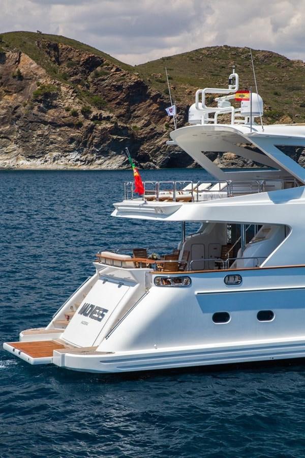 a boat on the water aboard MADNESS Yacht for Sale