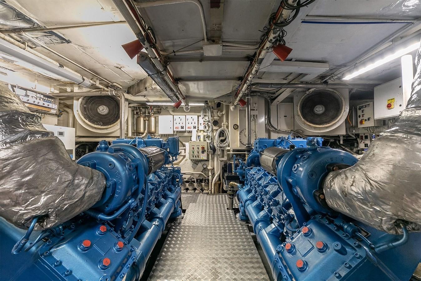 a room full of blue pipes aboard EMERA Yacht for Sale