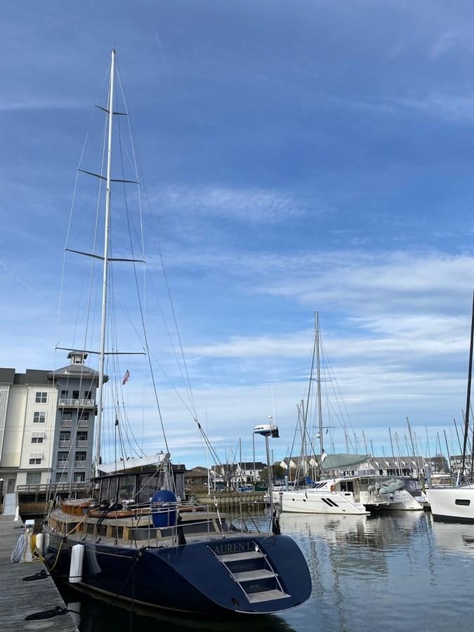 a group of boats are parked in a harbor aboard LAUREN L Yacht for Sale
