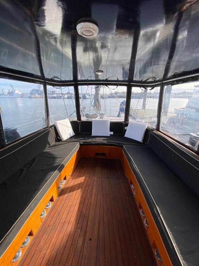 a room with a large window aboard LAUREN L Yacht for Sale