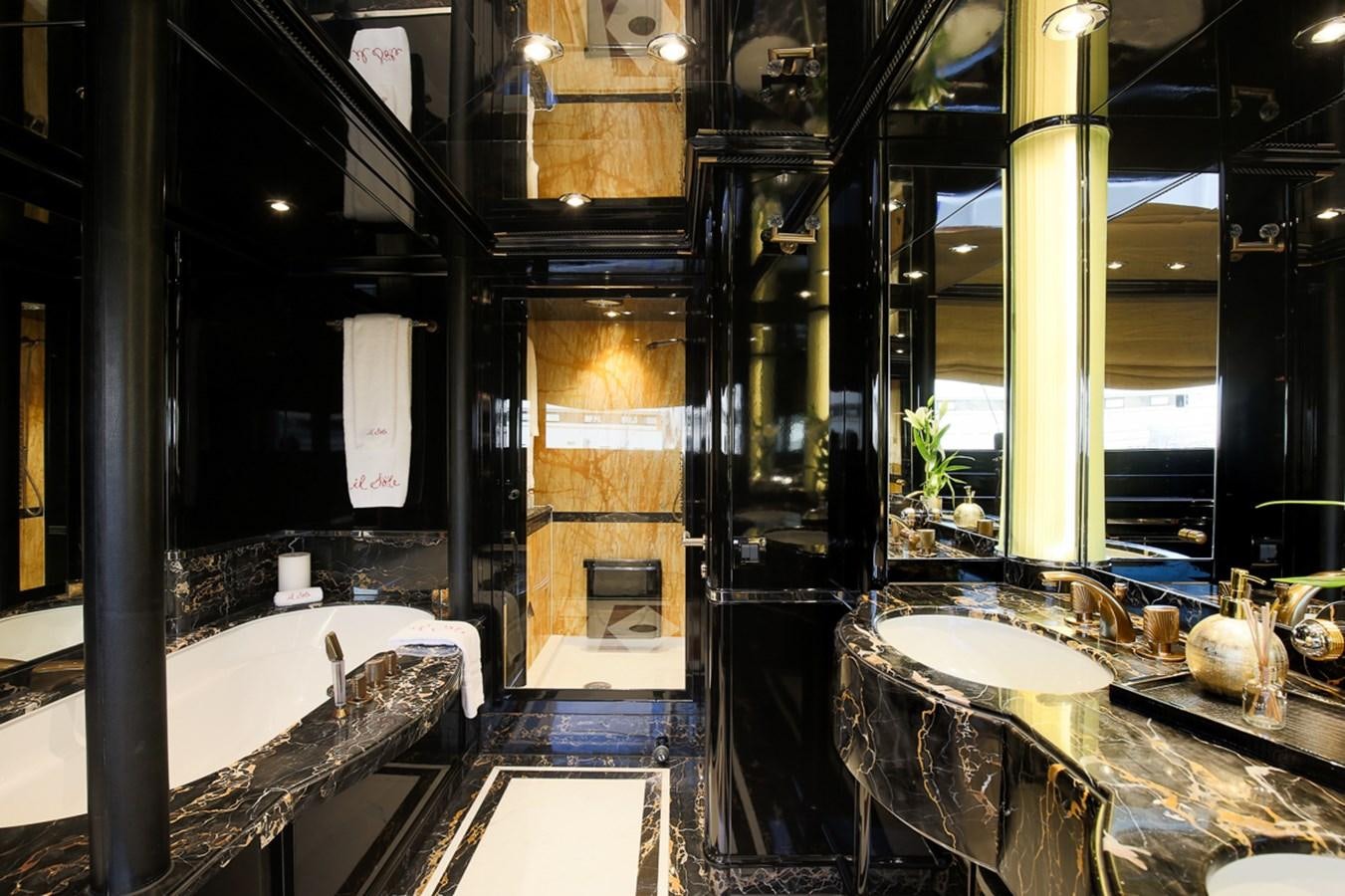 a bathroom with a large marble counter aboard IL SOLE Yacht for Sale
