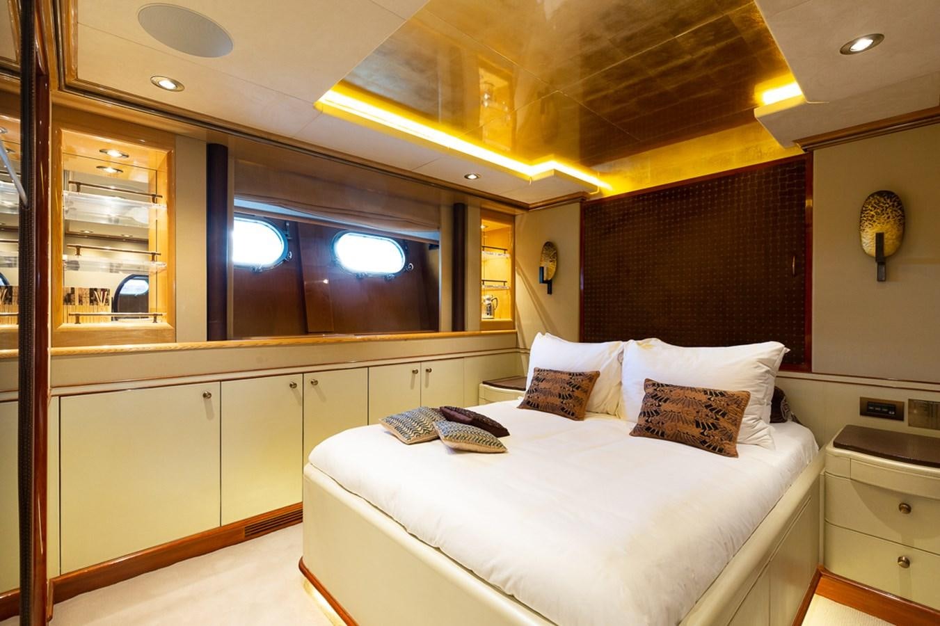 a room with a bed and a tv aboard IL SOLE Yacht for Sale