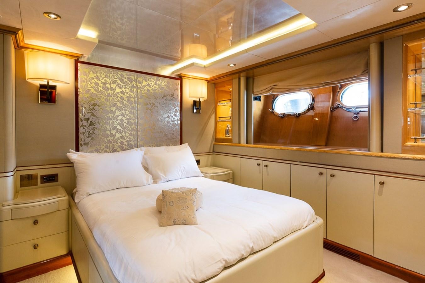 a room with two beds aboard IL SOLE Yacht for Sale
