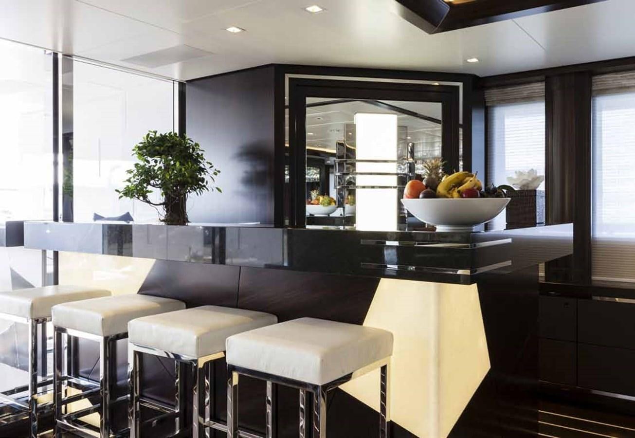 a kitchen with a large island aboard JULIA Yacht for Sale