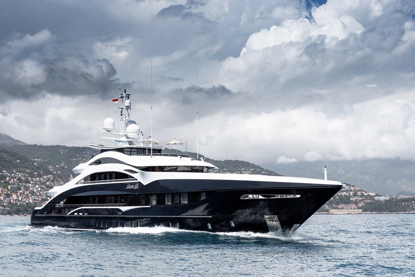 a large ship in the water aboard JULIA Yacht for Sale