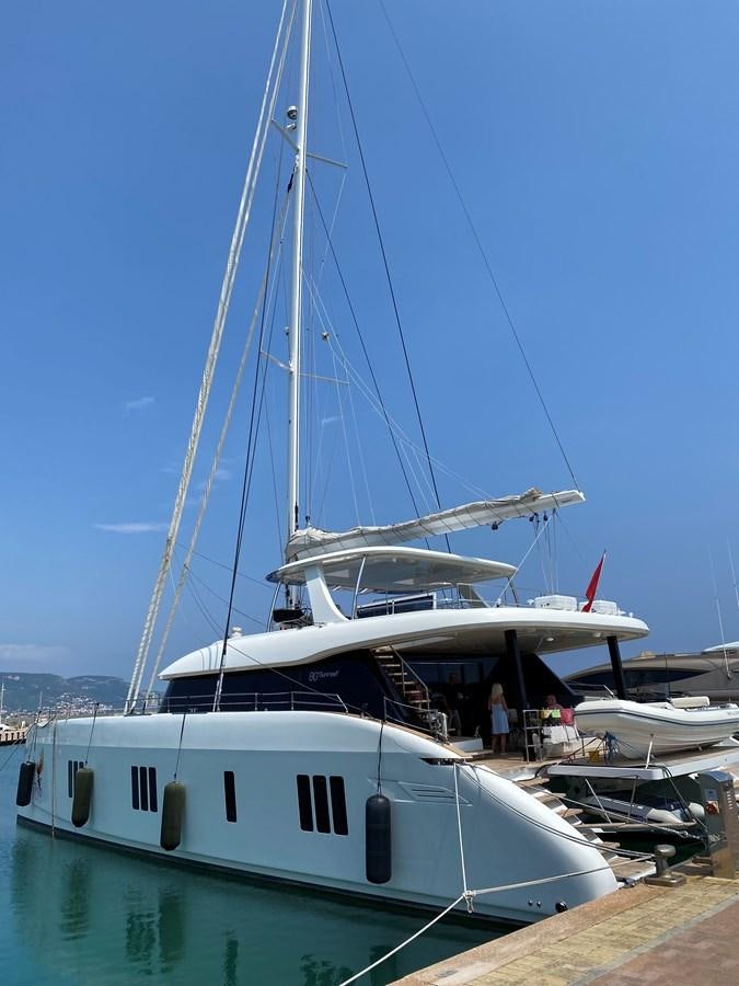 a boat docked at a pier aboard GIJA Yacht for Sale