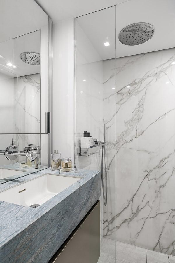 a bathroom with a marble counter top aboard GIJA Yacht for Sale